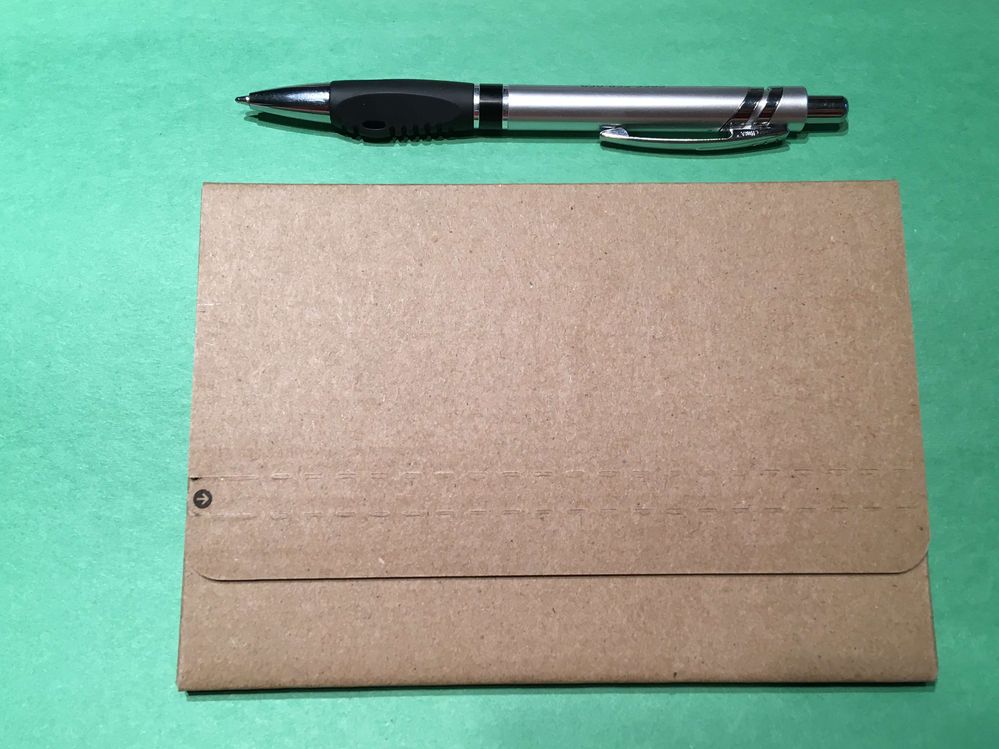 Sealed outer cardboard envelope